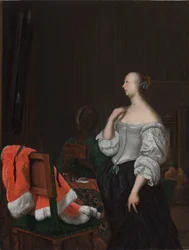 Une femme devant un miroir