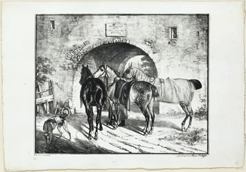Trois chevaux près du passage du portail
