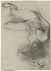 Femme nue allongée sur le sol