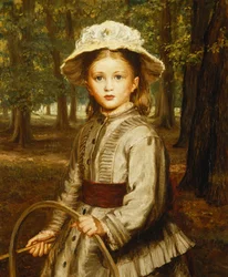 Une jeune fille jouant avec un cerceau