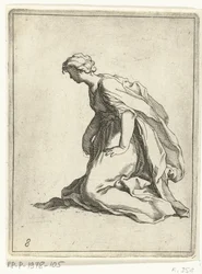 Jeune femme agenouillée