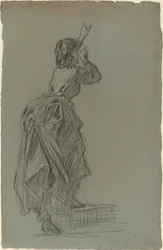 Jeune femme montant une marche