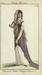 Femme à la mode avec un éventail