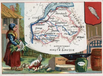 Haute-Savoie (74), Rhône-Alpes, France. Spécialité locale : papier, gruyère, miel, tabac et hauts fourneaux. Série sur les départements français. Chromolithographie « le fil géographique », vers 1920. Collection privée