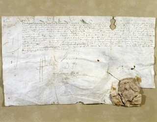 Lettre signée par Henri IV, instituant Dinan comme Présidial après que la ville lui ait été rendue