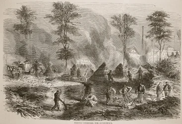 Fabrication de charbon de bois pour la poudre à canon, illustration de l