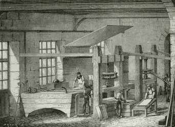 Fabrication de papier à la main par tamisage de la pâte. Gravure vers 1870.