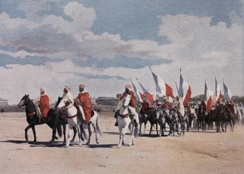 Spahis natifs allant à une fantaisie en grande pompe, bannières déployées - dans "Album militaire" - Spahis