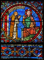 Le donateur Henry Noblet priant devant le Christ
