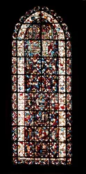 Vitrail représentant des scènes de la vie des saints