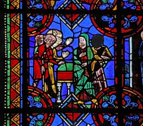 Fenêtre w06 représentant des pèlerins venant au tombeau de Saint Brioude