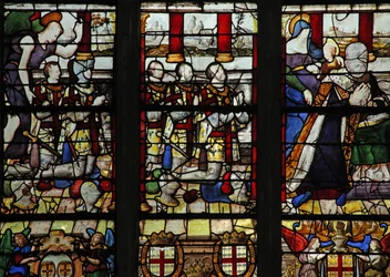 Vitrail w13 représentant Anne de Montmorency avec son saint patron Sainte Anne (enseignant la lecture à la Vierge) et 5 de ses fils