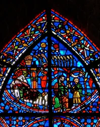 Fenêtre w9 représentant le rêve de Joseph ; le soleil, la lune, les étoiles et les gerbes de blé de ses frères s