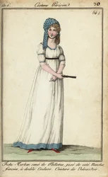 Femme en turban-foulard et robe tunique
