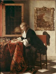 Homme écrivant une lettre