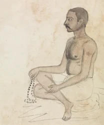 Homme avec des perles de prière