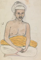 Homme avec un tissu jaune sur ses genoux