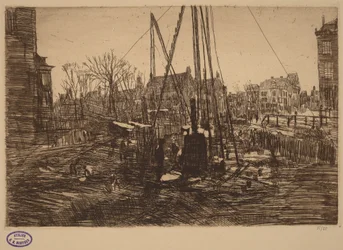 Scène dans une ville néerlandaise avec une sonnette de battage au premier plan