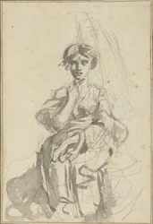 Figure féminine assise