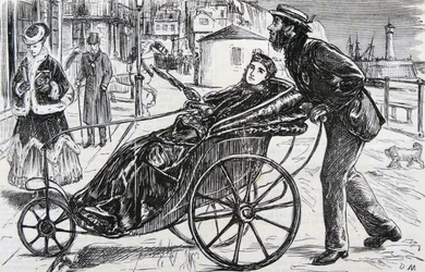 Patrick poussant la chaise de bain de la dame