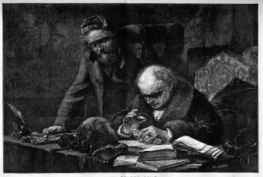 Un égyptologue étudiant une pièce archéologique d