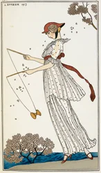 Une femme portant une robe en lin blanc imprimé, jouant avec un jouet