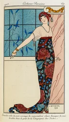 Grande robe du soir, corsage de mousseline chair tunique de soie brodée dans le goût de la « Compagnie des Indes ». Costumes Parisiens no.69. Femme portant une robe de soirée avec un corsage en mousseline et une tunique en soie brodée. Elle porte également