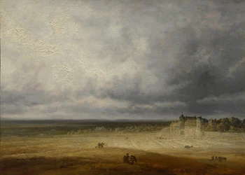 Paysage avec un champ labouré et un village