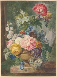 Bouquet de fleurs dans un vase avec un nid d