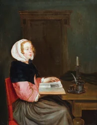 Un intérieur avec une femme assise à une table tenant un livre (huile sur panneau)