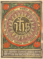 Monogramme JHS dans un cercle enflammé
