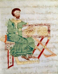 Le changeur, ancêtre du banquier. Miniature tirée du manuscrit « De Universo » (ou De rerum naturis (De la nature des choses)) (cod. 132) par Rabanus Maurus Magnentius (ca. 780-856). IXe siècle. Archives de l