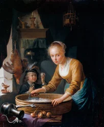 Fille coupant des oignons
