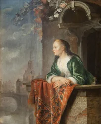 Jeune femme sur un balcon