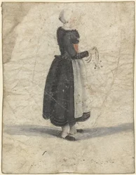 Femme de la Hollande-Septentrionale debout avec un ornement ou un sac à la main