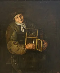 Vieille femme avec une lampe