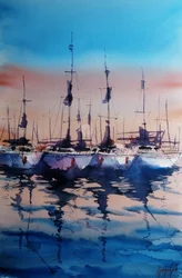 Des voiliers au coucher du soleil