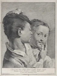 Garçon avec un chapeau touchant le visage d