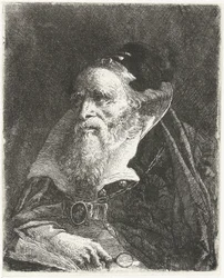 Vieil homme avec un livre et une loupe
