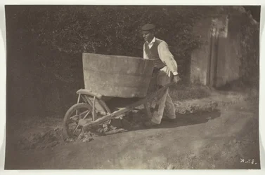 Paysan avec une brouette