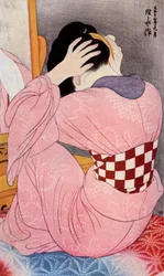 Une femme japonaise coiffant ses cheveux, années 1920-1930