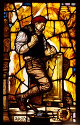Panneau de fenêtre représentant un tailleur de pierre (vitrail)