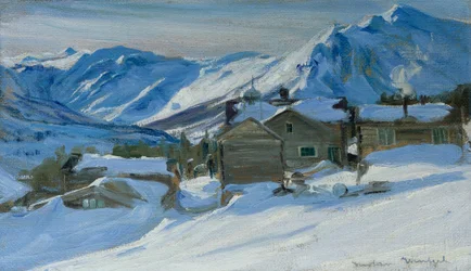 Ferme de montagne dans un paysage enneigé