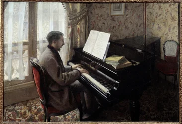Jeune homme jouant du piano