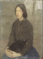 Fille avec un chat sur ses genoux