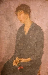 Femme tenant une fleur