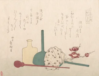 Objets en verre avec des fleurs de prunier