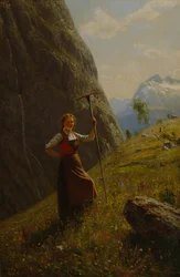 Laitière avec un râteau