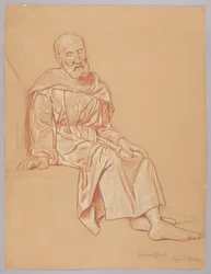 Vieil homme assis sur une pierre