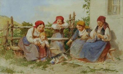 Femmes et enfants avec un chat jouant